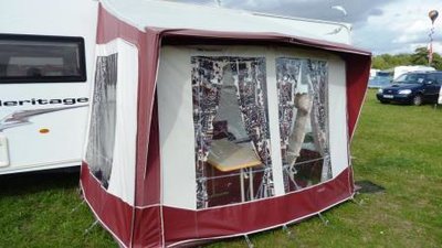 Awning with curtains 2.JPG